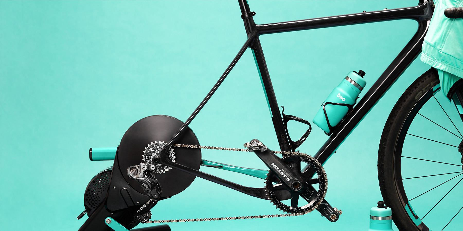 Stainless steel Bivo One water bottle on bike trainer in cycling cage.